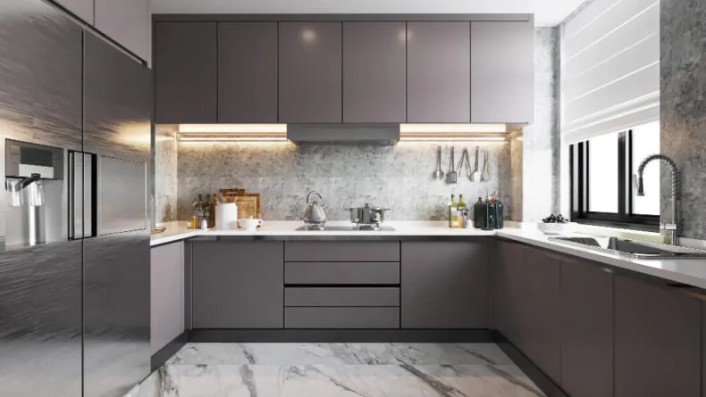 A new kitchen with modern appliances, counters, and cabinetry after remodeling from Beyond Builders